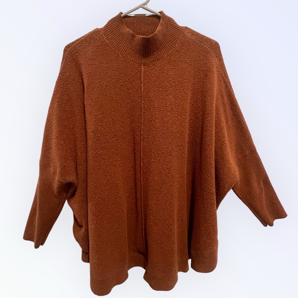 Terracotta color turtleneck poncho style sweater great condition size XL.